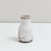 Small naked raku thin bottle vase | Braer Studio